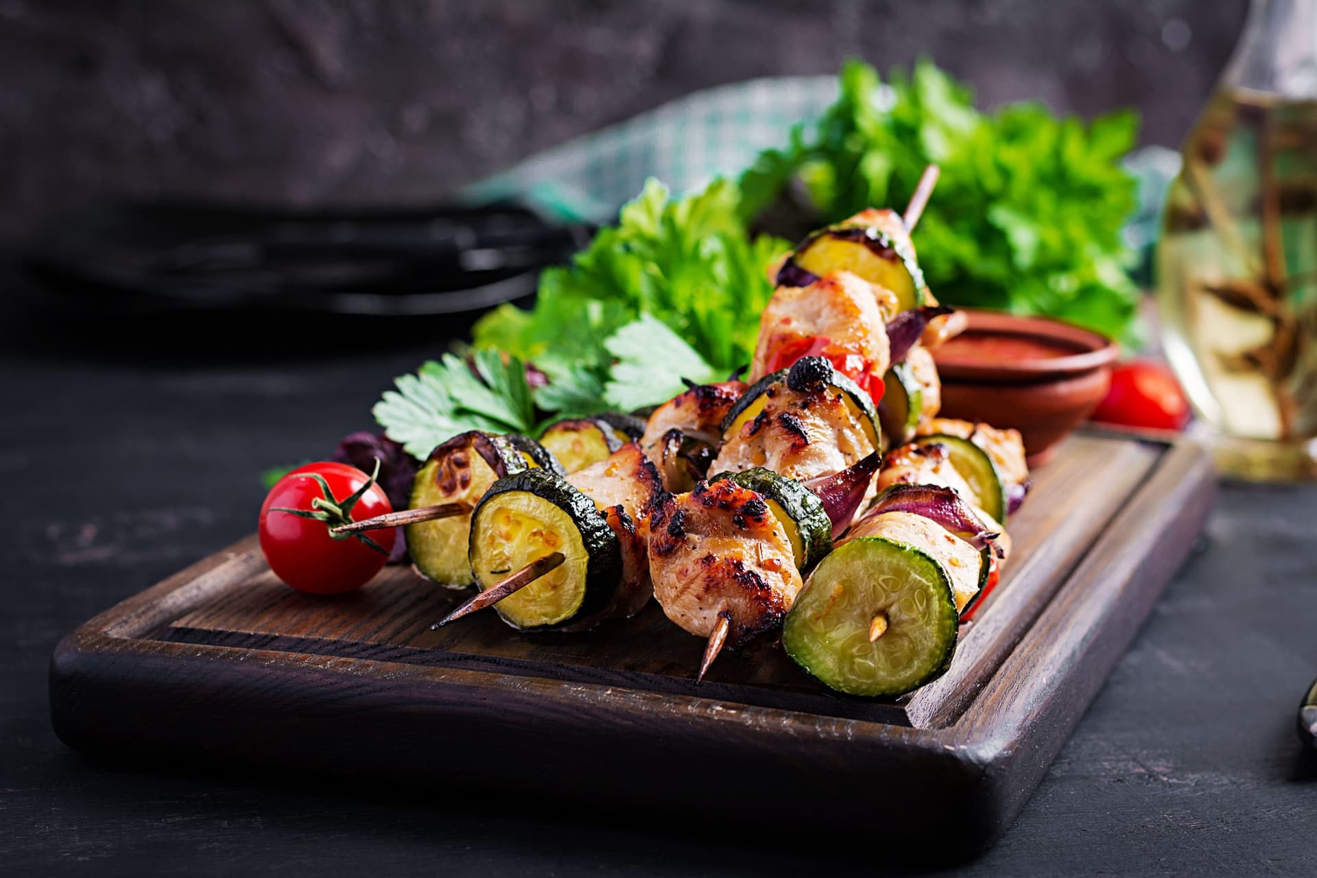 grilled-meat-skewers-chicken-shish-kebab-with-zucchini-tomatoes-red-onions.jpg